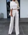 Elegante conjunto casual de dos piezas en crema con top corto y pantalón ancho - S / Parte Superior y Parte Inferior / Blanco