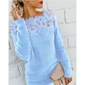 Close-up of light blue fuzzy sweater featuring intricate floral lace neckline detail - S / Tops / Blue