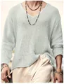Détail de la maille ajourée respirante sur ce pull pour homme avec un col en V élégant - S / Hauts / Gris