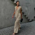 Detailed view of women's beige cotton V-neck sleeveless top and wide-leg trousers set - Khaki