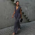 Elegant dark grey sleeveless V-neck top and wide-leg pants set in street style view - S / Top And Bottom / Gray
