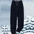 Close-up detail of black fuzzy fleece lounge pants with white drawstring in a snow scene - 3XL / Bottoms / Navy Blue