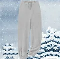 Detailed view of the soft grey fuzzy fleece fabric on these warm winter lounge pants - S / Bottoms / Gray