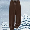 Close-up of warm brown plush fleece sweatpants featuring an elastic drawstring waist - 3XL / Bottoms / Coffee