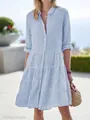 Details of blue and white striped shirt dress with a tiered skirt and button-up front - S / Dresses / Blue