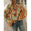 Bohemian V-neck blouse featuring vibrant peacock floral prints and stylish bell sleeves - S / Tops / Orange
