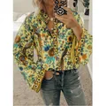 Detailed view of yellow bohemian style peacock floral print loose long sleeve shirt - S / Tops / Yellow