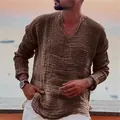 Primo piano sui bordi sfrangiati e sulla trama del tessuto in lino di questa camicia - Taglia S / Top / Caffè