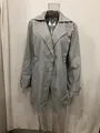 Detailed view of the front of a men's mid-length slim fit grey trench coat jacket. - S / Gray