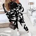 Close-up of casual women's two-piece tracksuit with bold geometric black and white print - S / Top And Bottom / Black
