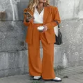 Fashionable orange women's professional suit set featuring a tailored blazer and wide-leg trousers - Chocolate
