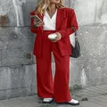 Detailed professional view of women's red tailored blazer and wide-leg trousers set - Red