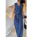 Elegant blue two-piece set featuring V-neck sleeveless vest and wide-leg trousers. - Sapphire Blue