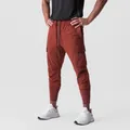 Professional men's burnt sienna cargo joggers featuring multiple pockets and rib-cuffed ankles - Brick Red