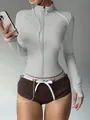 Women's slim-fit light grey athletic yoga jacket featuring front zipper and thumb holes - S / Tops / Grayish White