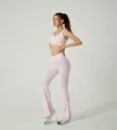 Two-piece pink yoga set with crossover high-waisted flare leggings and sports bra - S / Top And Bottom / Two-Piece Set / Light Pink