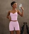 Pink halter neck backless yoga set with padded sports top and high waist fitness shorts. - S / Top And Bottom / Pink