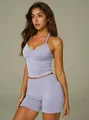 Lavender halter neck yoga set with padded sports bra and high waisted fitness shorts - S / Top And Bottom / Light Purple
