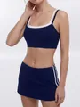 Navy blue yoga set featuring crop top sports bra and double side-striped mini skirt - S / Top And Bottom / Sapphire Blue