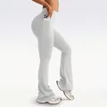 High-waisted light grey flare yoga pants with functional side pockets and peach lift - S / Bottoms / Cloud Grey