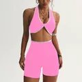 Completo da yoga rosa acceso senza cuciture con reggiseno a incrocio e pantaloncini alti - Rosa