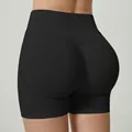 Zwarte sportshort met hoge taille en naadloos hip-lifting design voor fitness en hardlopen. - S / Bottoms / Zwart
