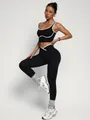 Two-piece black yoga set with white trim including sports bra and high-waist leggings - S / Top And Bottom / Black