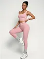 Set da yoga rosa a vita alta con reggiseno sportivo e leggings con bordi bianchi - Rosa
