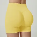 Gelbe nahtlose Fitness-Shorts mit hoher Taille und Hip-Lifting-Design für Sportlerinnen. - Gelb