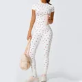 Ensemble de yoga blanc pour femme avec motif cerises, haut à manches courtes et legging - S / Haut Et Bas / Imprimé Cerise
