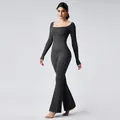 Elegant long-sleeve charcoal grey yoga jumpsuit with flared legs and scooped neckline - S / Set / Gray