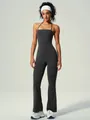 Sleek charcoal yoga jumpsuit with halter neck and flared leg pants for fitness - S / Jumpsuit / Gray