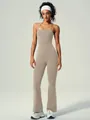 Sleeveless beige halter neck yoga jumpsuit with flared pants for women fitness. - S / Jumpsuit / Linen