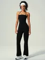 Black halter neck yoga jumpsuit with flare pants for fitness and gym wear - M / Jumpsuit / Black