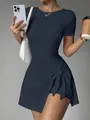 Slim fit navy blue tennis dress with side bow and built-in shorts for active leisure - S / Dresses / Navy Blue