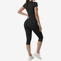 Two-piece black yoga set with short sleeve top and high-waist capri leggings - S / Top And Bottom / Black