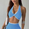 Premium sky blue twist-knot halter yoga sports bra with white trim and padded support - XS / Tops / Light Blue