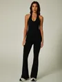 Black seamless halter neck yoga jumpsuit with flare legs and backless fitness design - S / Set / Black