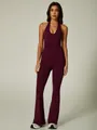 Sleek seamless halter neck yoga jumpsuit featuring flared legs in elegant deep maroon color - S / Set / Cherry Purple