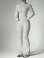 Premium light gray two-piece yoga set featuring a zipper jacket and flared gym pants - Cloud Grey
