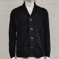 Detailed view of men's black cable knit cardigan sweater featuring large buttons and shawl collar - S / Tops / Dark Gray