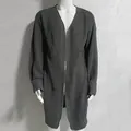 Detailed view of grey waffle knit long cardigan with ribbed cuffs for men - S / Tops / Gray