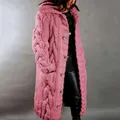 Close-up detail of a pink chunky cable knit long cardigan for women with large buttons - S / Tops / Pink
