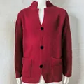 Detailed view of a red waffle knit cardigan sweater for men with a slim-fit standing collar design - S / Tops / Red