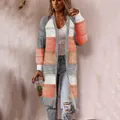 Detail of women's autumn striped knit cardigan with vibrant orange and grey blocks - S / Tops / Gray