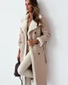 Detail of women's beige long coat with cozy white faux shearling lining and lapels - S / Tops / Apricot
