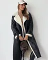 Detail view of stylish black faux leather coat with white shearling lapel for winter - S / Tops / Black