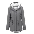 Close-up view of women's gray winter parka featuring a cozy white fleece lining. - Gray
