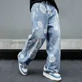 Stylish men's light blue wide-leg denim jeans featuring large white rose floral prints - XS / Bottoms / Dark Blue