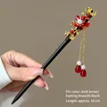 Detailed macro view of 18cm dark brown Chinese style tassel hairpin for elegant styling - 18cm / Yiren Style (FZ25018)